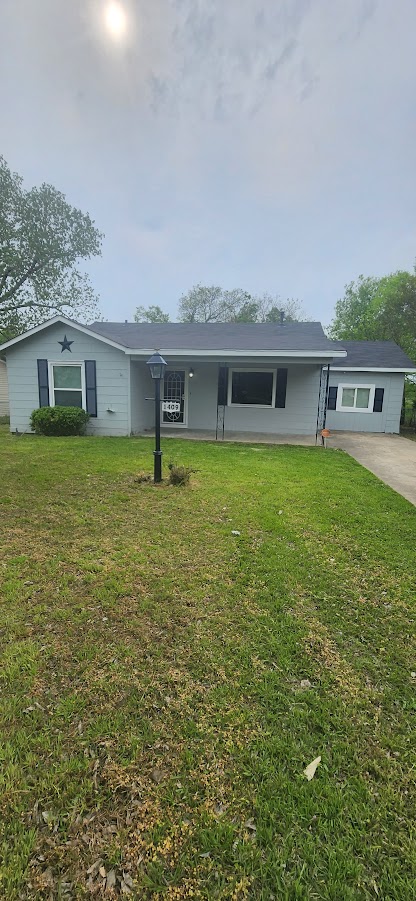 1409 Wolfe City Drive